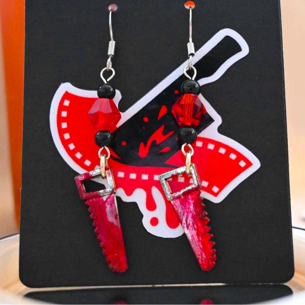 Handmade in the US bloody saw earrings 👻